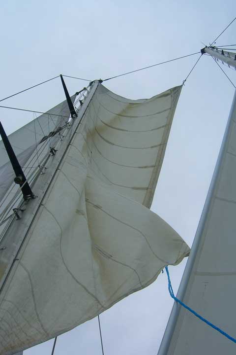 Fisherman being raised, peak halyard and sheet loose